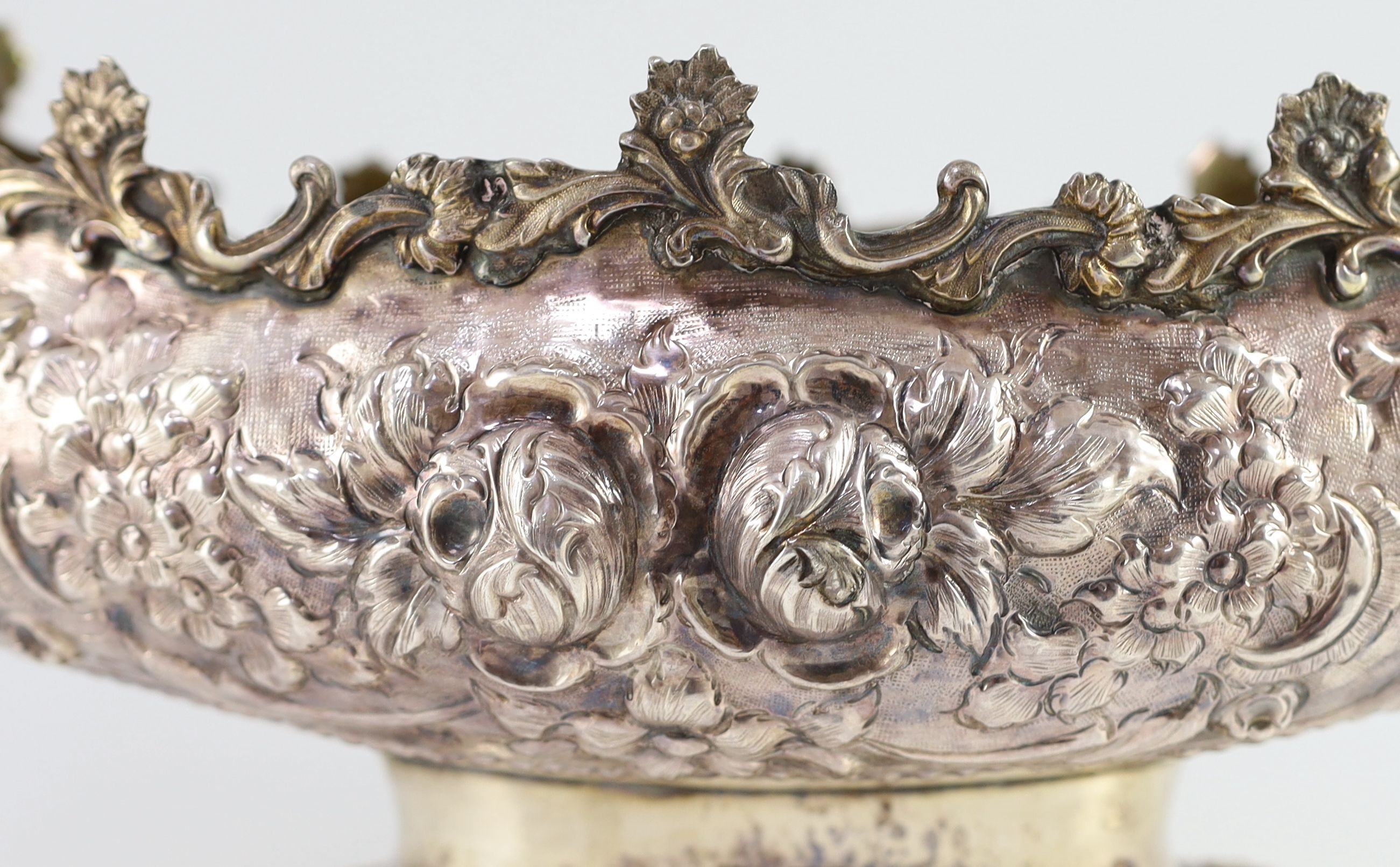 A 20th century Continental embossed 900 standard silver boat shaped centrepiece bowl